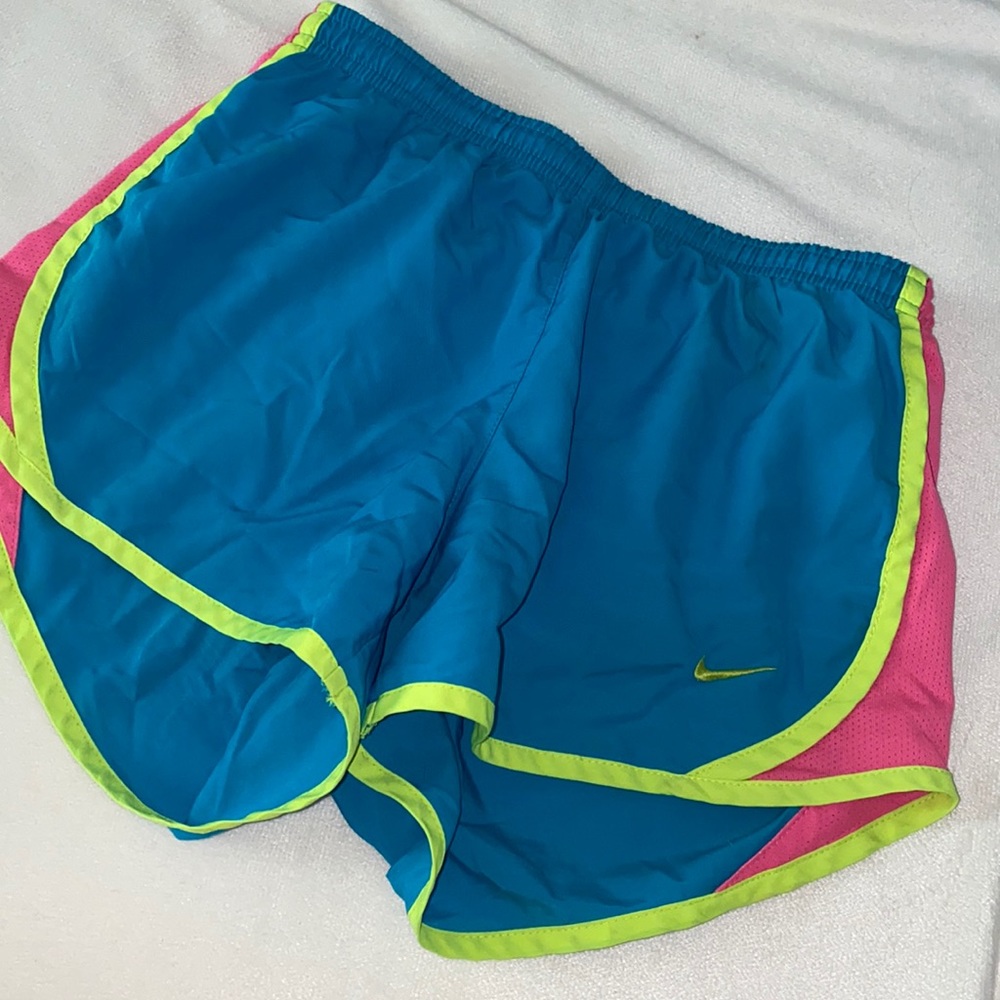 Blue neon colored Nike shorts